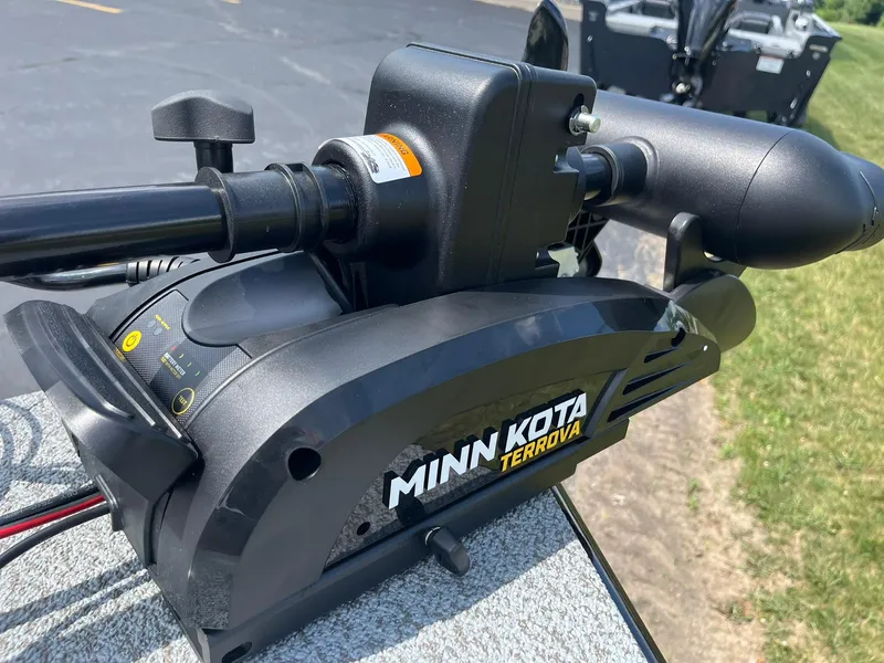 Slide: The Image of Minn Kota Terrova motor on 2026 Lund 1675 Adventure SS boat, outdoor setting. - 23