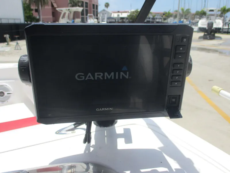 Slide: The Image of Garmin display on 2019 Tahoe 2150 boat, docked in marina. - 18
