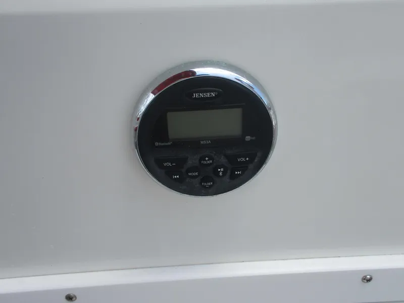 Slide: The Image of Jensen audio control panel on 2019 Tahoe 2150 boat dashboard. - 27