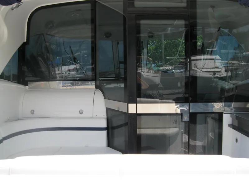 Slide: The Image of Interior view of a 2017 Formula 45 Yacht with seating and glass doors. - 13