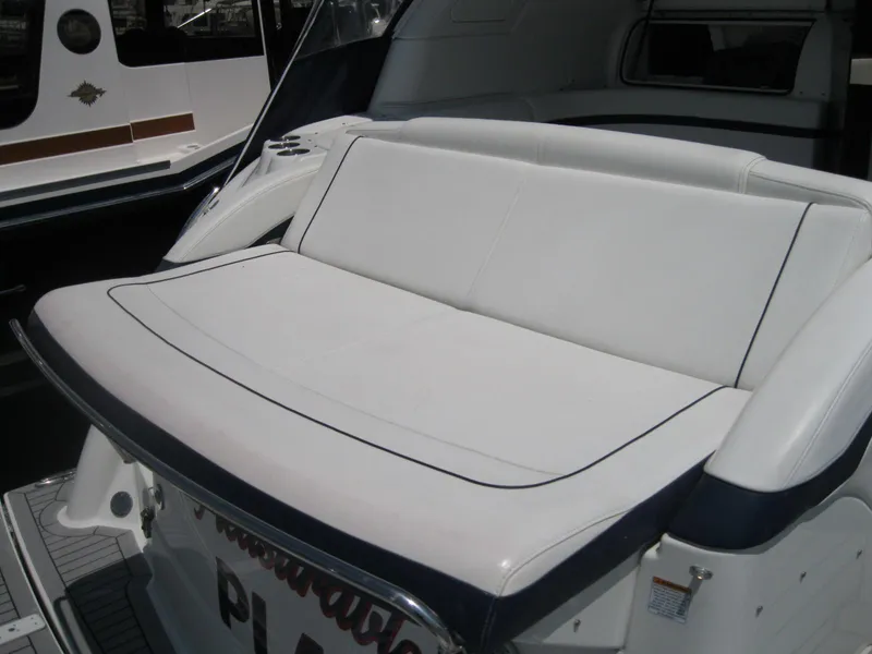 Slide: The Image of 2017 Formula 45 Yacht with white cushioned seating area. - 14
