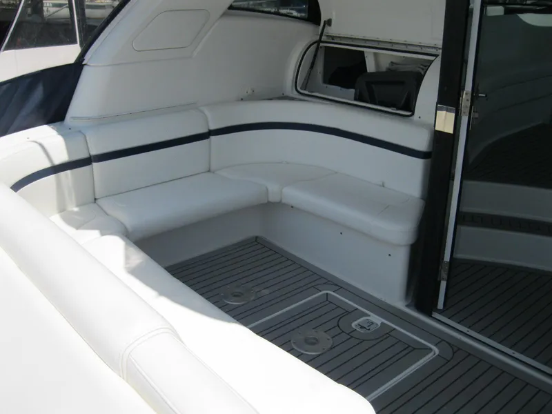 Slide: The Image of 2017 Formula 45 Yacht interior with white seating and sleek design. - 15