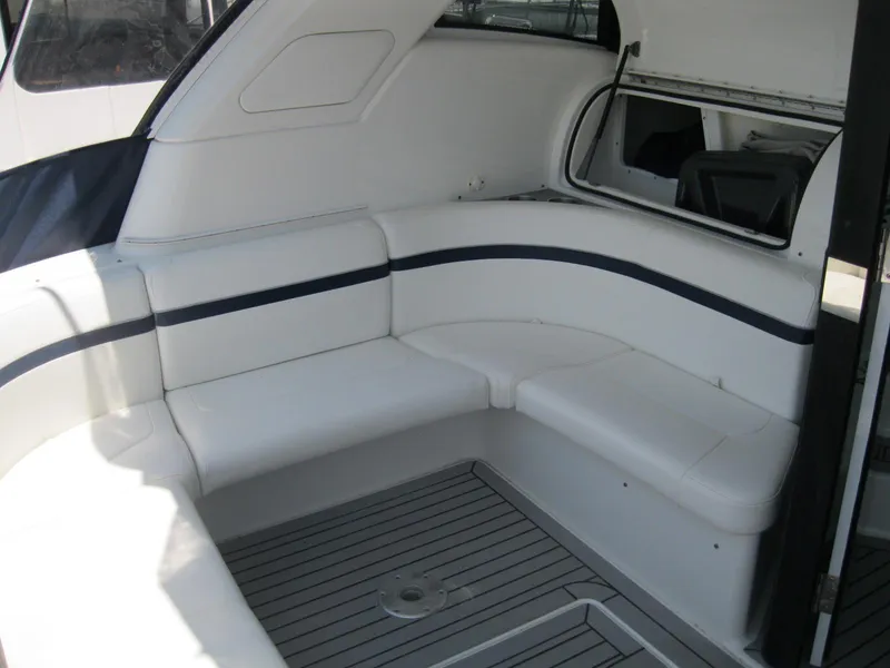 Slide: The Image of 2017 Formula 45 Yacht interior with white seating and sleek design. - 17