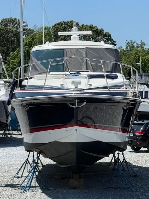 Slide: The Image of 2017 Formula 45 Yacht on stands, front view, outdoors, sunny day. - 2