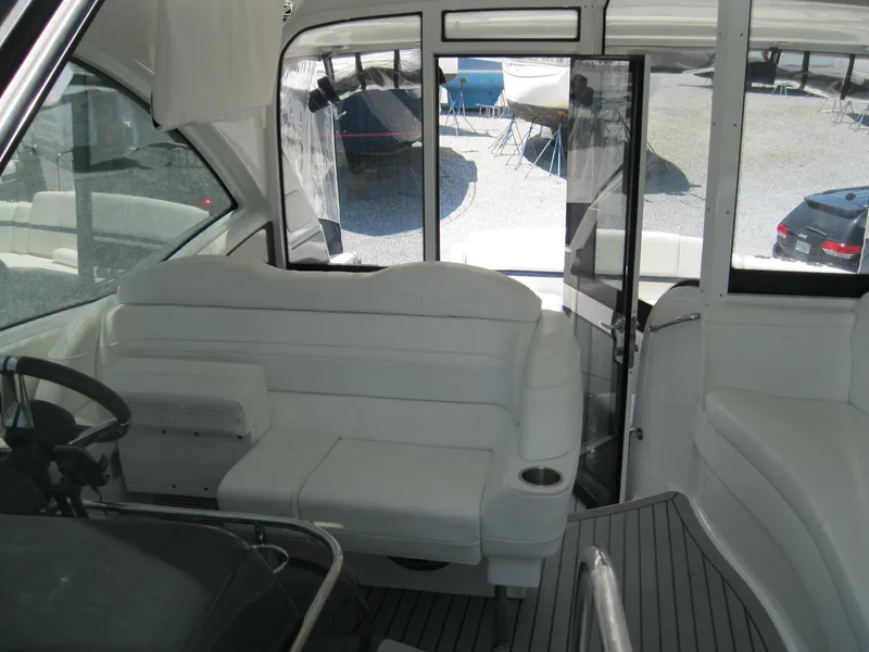 Slide: The Image of Interior of 2017 Formula 45 Yacht with white seating and modern design. - 21