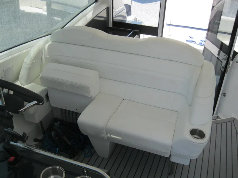 Slide: The Image of 2017 Formula 45 Yacht interior with white leather seating and cup holder. - 26