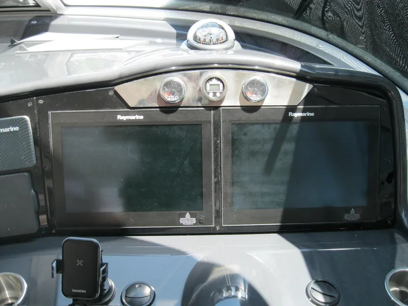 Slide: The Image of Control panel of 2017 Formula 45 Yacht with Raymarine displays and gauges. - 28
