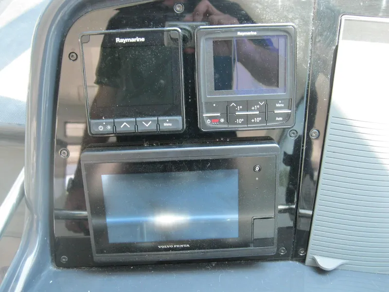 Slide: The Image of Control panel of a 2017 Formula 45 Yacht with Raymarine and Volvo Penta displays. - 29