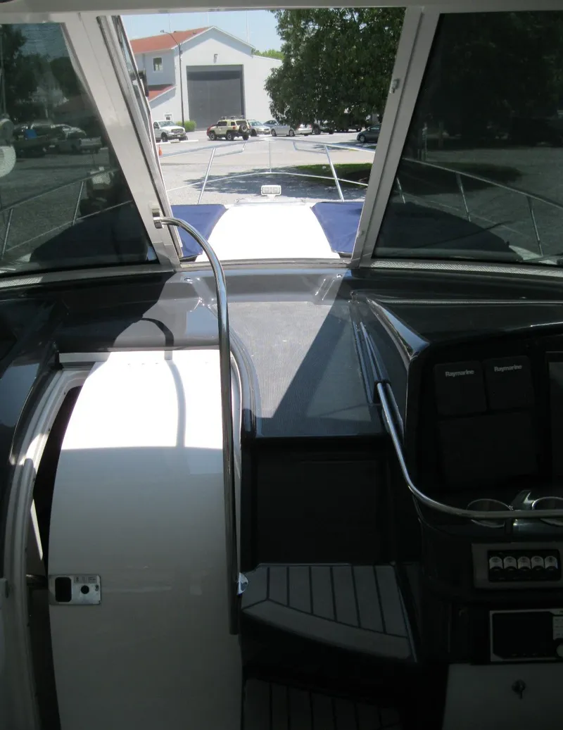 Slide: The Image of Interior view of a 2017 Formula 45 Yacht cockpit with open hatch and dashboard. - 31