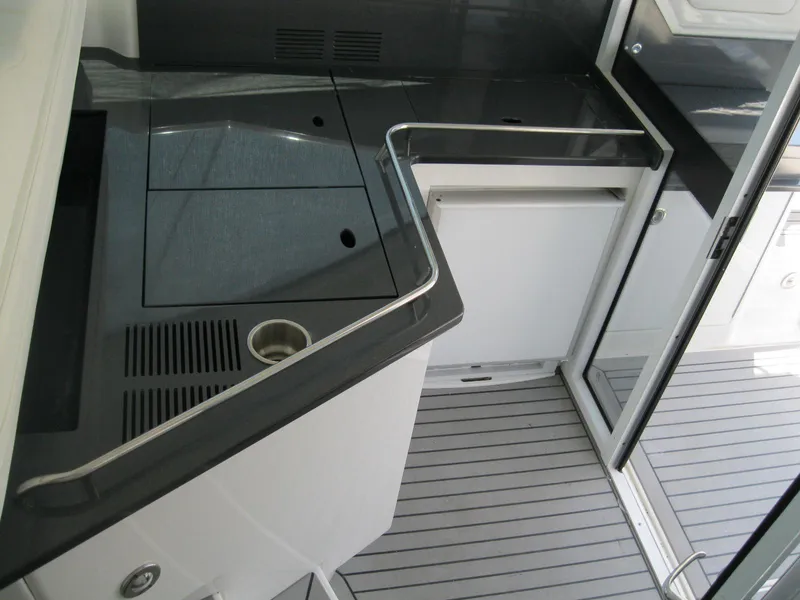 Slide: The Image of 2017 Formula 45 Yacht interior with sleek kitchen area and modern design. - 32