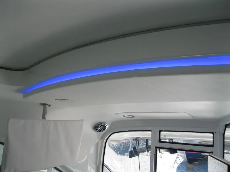 Slide: The Image of Interior of 2017 Formula 45 Yacht with blue LED lighting and modern design. - 35