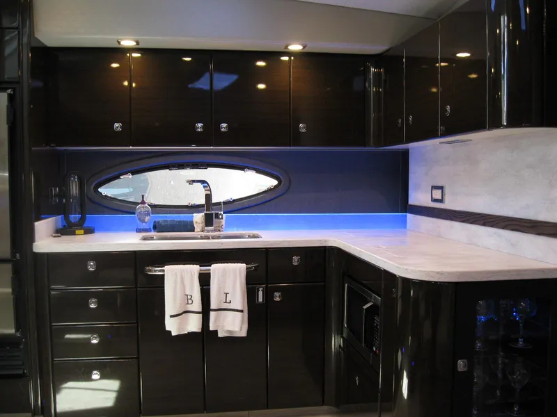 Slide: The Image of Luxurious kitchen interior of 2017 Formula 45 Yacht with modern cabinetry and ambient lighting. - 39