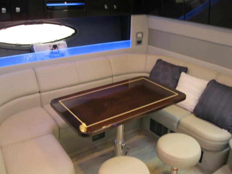 Slide: The Image of Luxurious interior of 2017 Formula 45 Yacht with elegant seating and wooden table. - 44