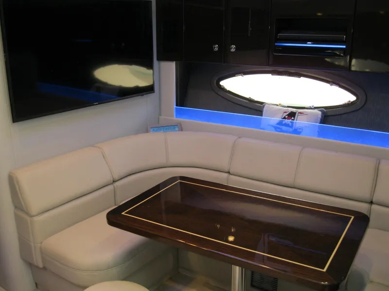 Slide: The Image of Luxurious interior of 2017 Formula 45 Yacht with plush seating and elegant table. - 46