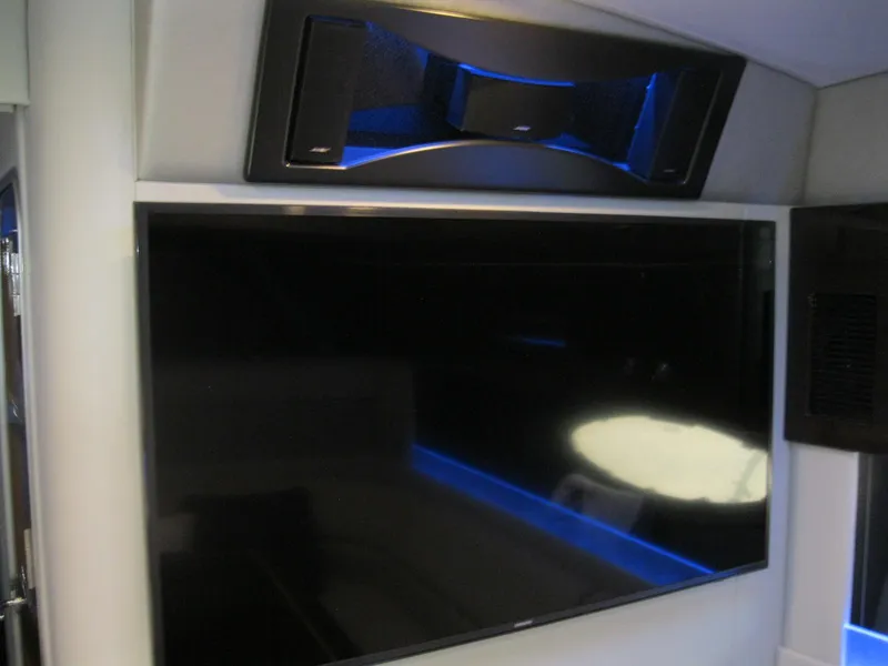 Slide: The Image of Entertainment system with a large screen and speaker on a 2017 Formula 45 Yacht. - 47