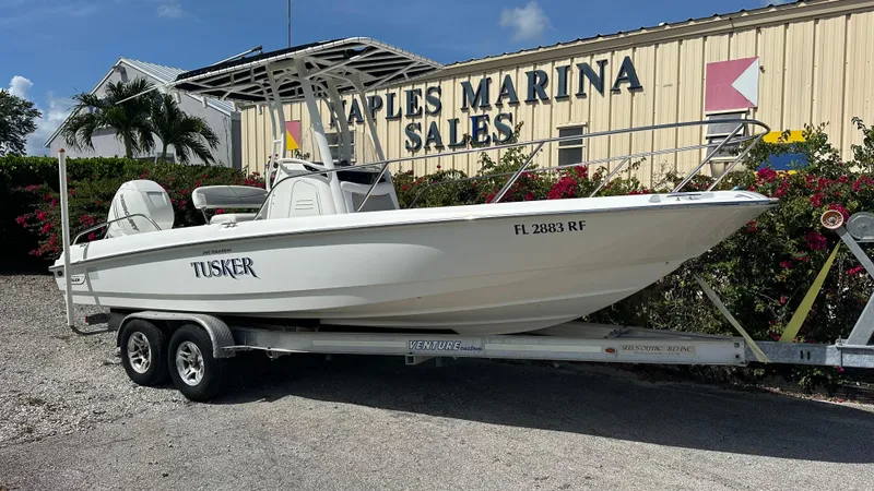 The Image of 2016 Boston Whaler 240 Dauntless boat on trailer at Naples Marina Sales. - 1