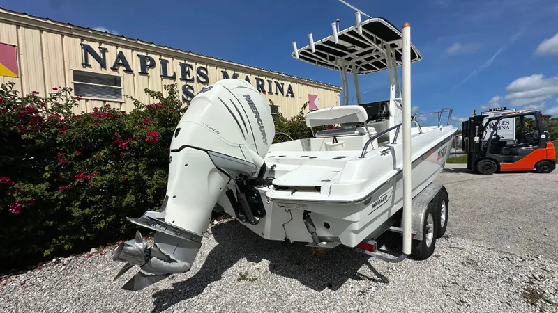 Slide: The Image of 2016 Boston Whaler 240 Dauntless boat on trailer at Naples Marina. - 3
