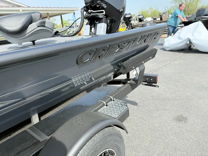 Slide: The Image of 2025 Crestliner XF 189 boat on trailer, featuring sleek design and comfortable seating. - 1