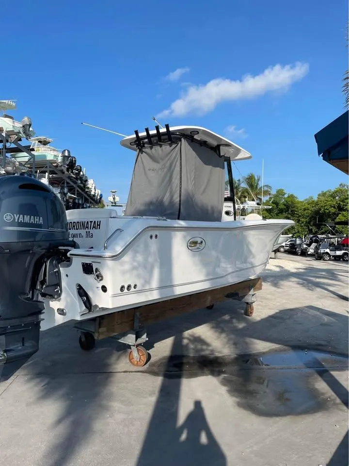 The Image of 2023 Sea Hunt Ultra 265 SE boat on display with Yamaha engine. - 0