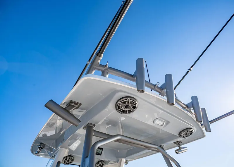 Slide: The Image of Rooftop view of 2025 Solace 30 CS boat against clear blue sky. - 24