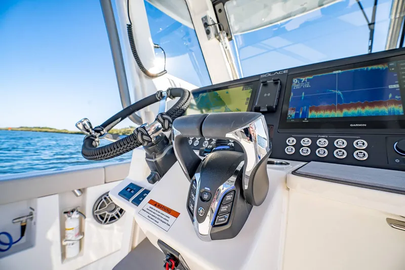 Slide: The Image of Control panel of 2025 Solace 30 CS boat with advanced navigation systems. - 29