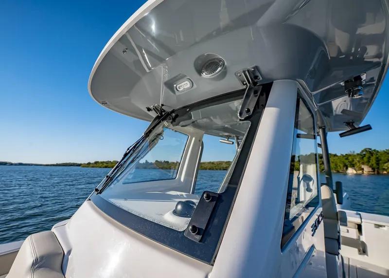 Slide: The Image of 2025 Solace 30 CS boat on water, showcasing sleek design and modern features. - 40