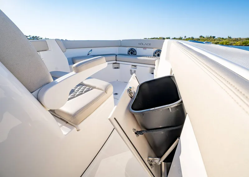 Slide: The Image of Interior of 2025 Solace 30 CS boat with seating and storage compartment. - 44