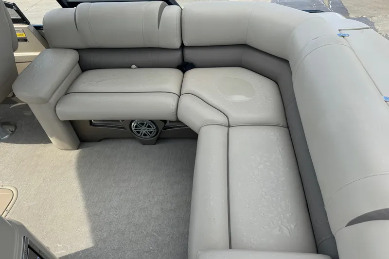 Slide: The Image of 2017 Tahoe Pontoon Cascade Platinum 2785EL interior seating with beige upholstery. - 10