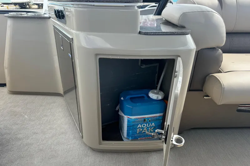 Slide: The Image of 2017 Tahoe Pontoon Cascade Platinum 2785EL interior storage with Aqua Pak container. - 8