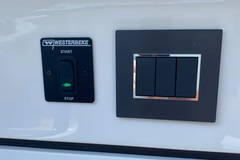 Slide: The Image of Control panel on 2022 Fairline F//Line 33 yacht with Westerbeke start-stop switch. - 20