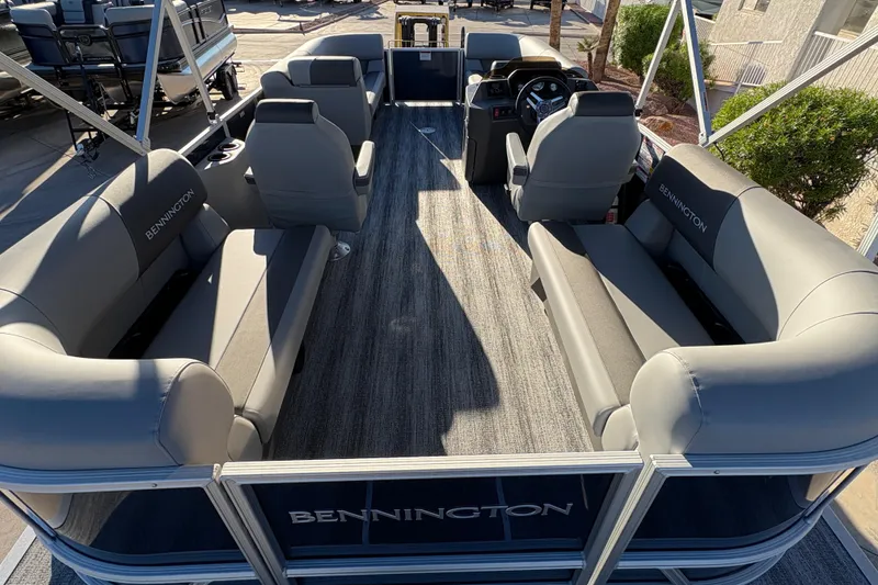 Slide: The Image of 2026 Bennington 21 SSR pontoon boat interior with gray seating and modern design. - 10