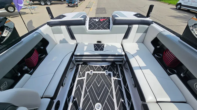 Slide: The Image of 2015 Nautique Super Air G23 interior with sleek seating and modern design. - 11