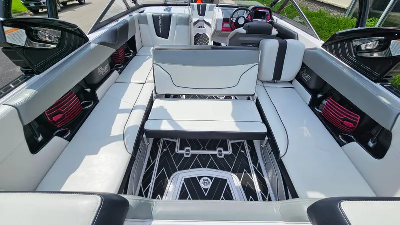 Slide: The Image of Luxurious interior of 2015 Nautique Super Air G23 boat with sleek seating and modern design. - 14