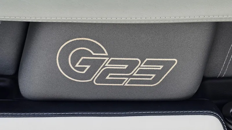 Slide: The Image of 2015 Nautique Super Air G23 logo on boat seat upholstery. - 34