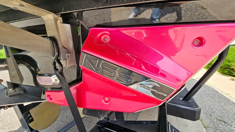 Slide: The Image of Close-up of 2015 Nautique Super Air G23 NSS waveplate in vibrant pink. - 7