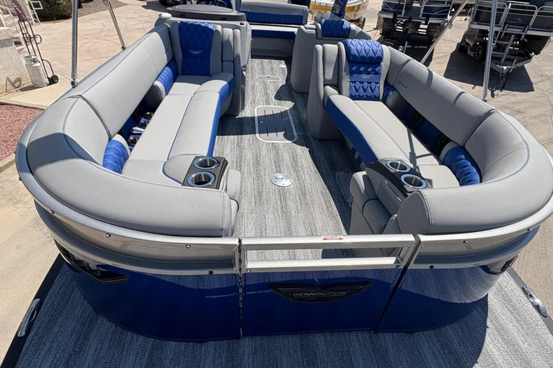 Slide: The Image of 2026 Bennington 27 RXSBAT2 pontoon boat with luxurious seating and modern design. - 13