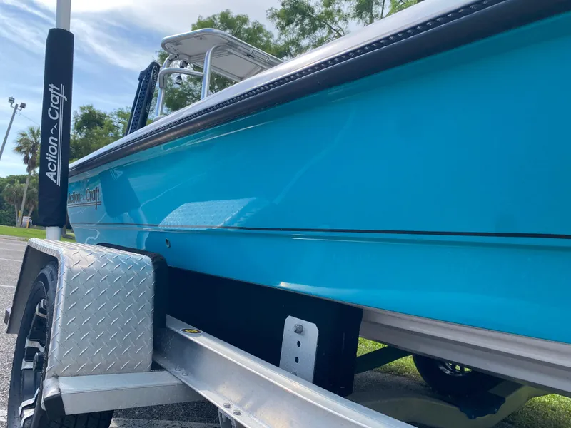 Slide: The Image of 2023 Action Craft 1720 Flats Gen 3 boat on trailer, vibrant blue color. - 15