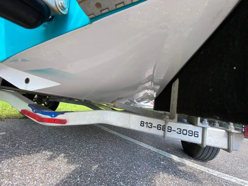 Slide: The Image of 2023 Action Craft 1720 Flats Gen 3 boat on trailer, close-up view. - 20