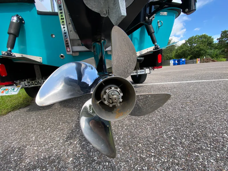 Slide: The Image of Propeller of 2023 Action Craft 1720 Flats Gen 3 boat on asphalt surface. - 24