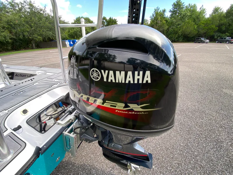 Slide: The Image of 2023 Action Craft 1720 Flats Gen 3 with Yamaha outboard motor in parking lot. - 25