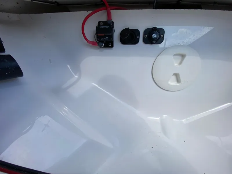 Slide: The Image of Interior view of 2023 Action Craft 1720 Flats Gen 3 boat with electrical components. - 36