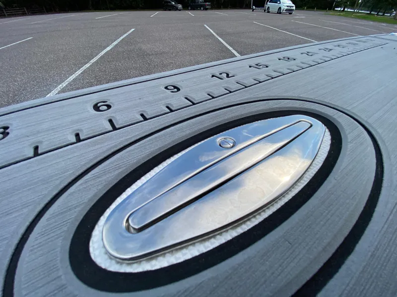 Slide: The Image of Close-up of 2023 Action Craft 1720 Flats Gen 3 boat deck with ruler and latch. - 41