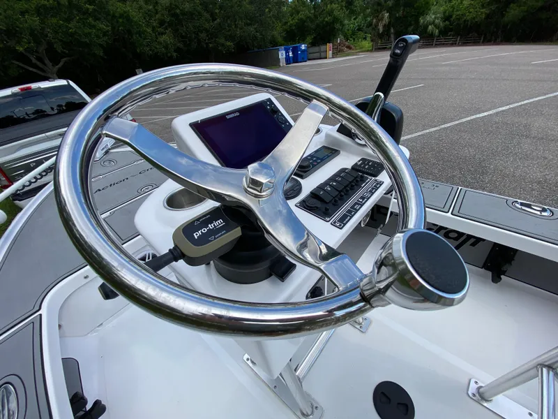 Slide: The Image of 2023 Action Craft 1720 Flats Gen 3 boat steering wheel and control panel. - 49
