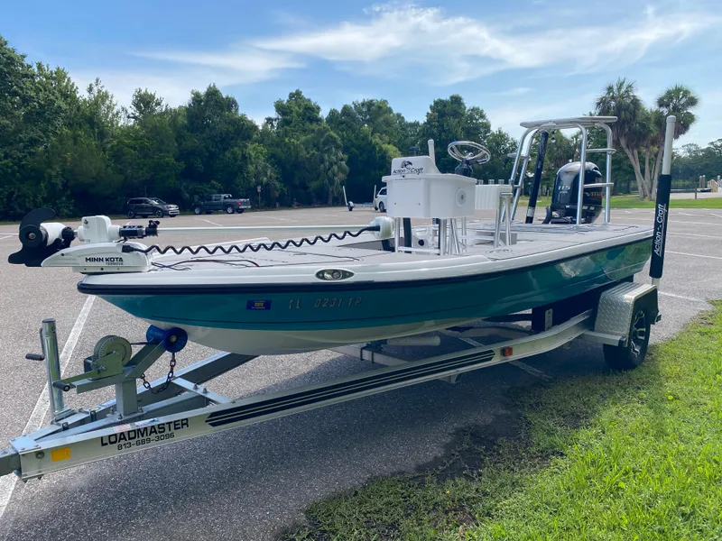 Slide: The Image of 2023 Action Craft 1720 Flats Gen 3 boat on trailer in parking lot. - 6