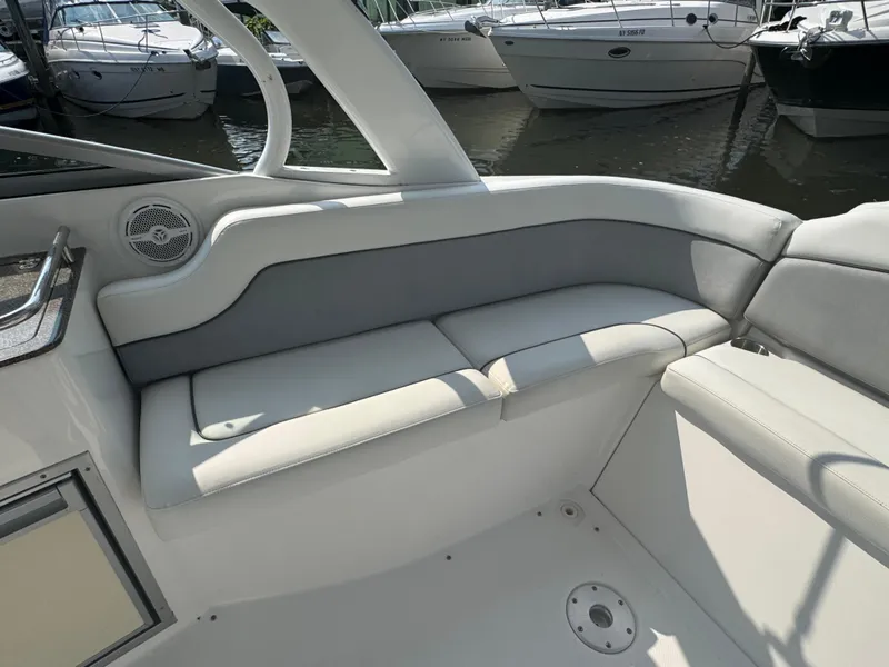 Slide: The Image of 2013 Rinker 296 Captiva Bowrider interior seating with sleek design and comfortable cushions. - 5