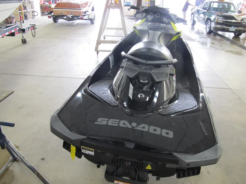 Slide: The Image of 2012 Sea-Doo RXP-X 260 jet ski in a garage setting. - 3