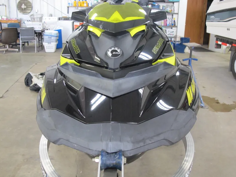 Slide: The Image of 2012 Sea-Doo RXP-X 260 jet ski in a garage setting. - 4