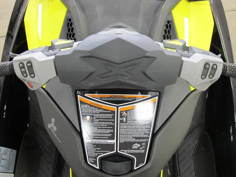 Slide: The Image of 2012 Sea-Doo RXP-X 260 dashboard with controls and warning labels. - 7