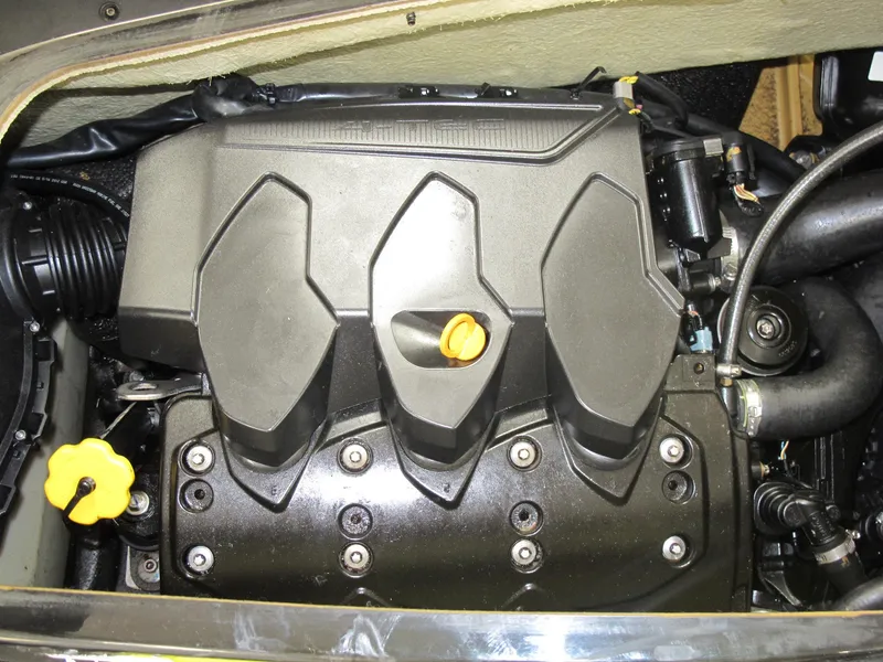Slide: The Image of 2012 Sea-Doo RXP-X 260 engine compartment, showcasing detailed components and design. - 8