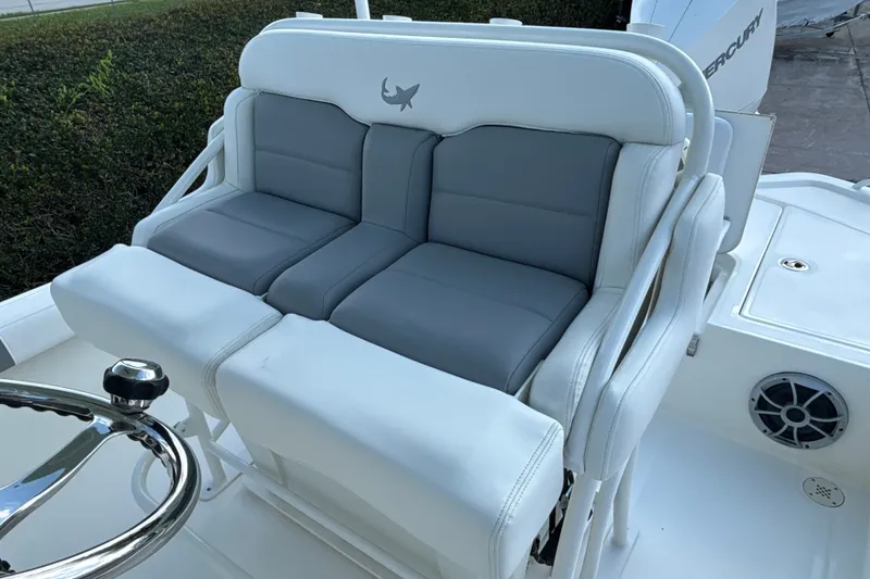 Slide: The Image of Luxury seating on 2025 Mako 24 APEX boat with sleek design and comfortable cushions. - 20